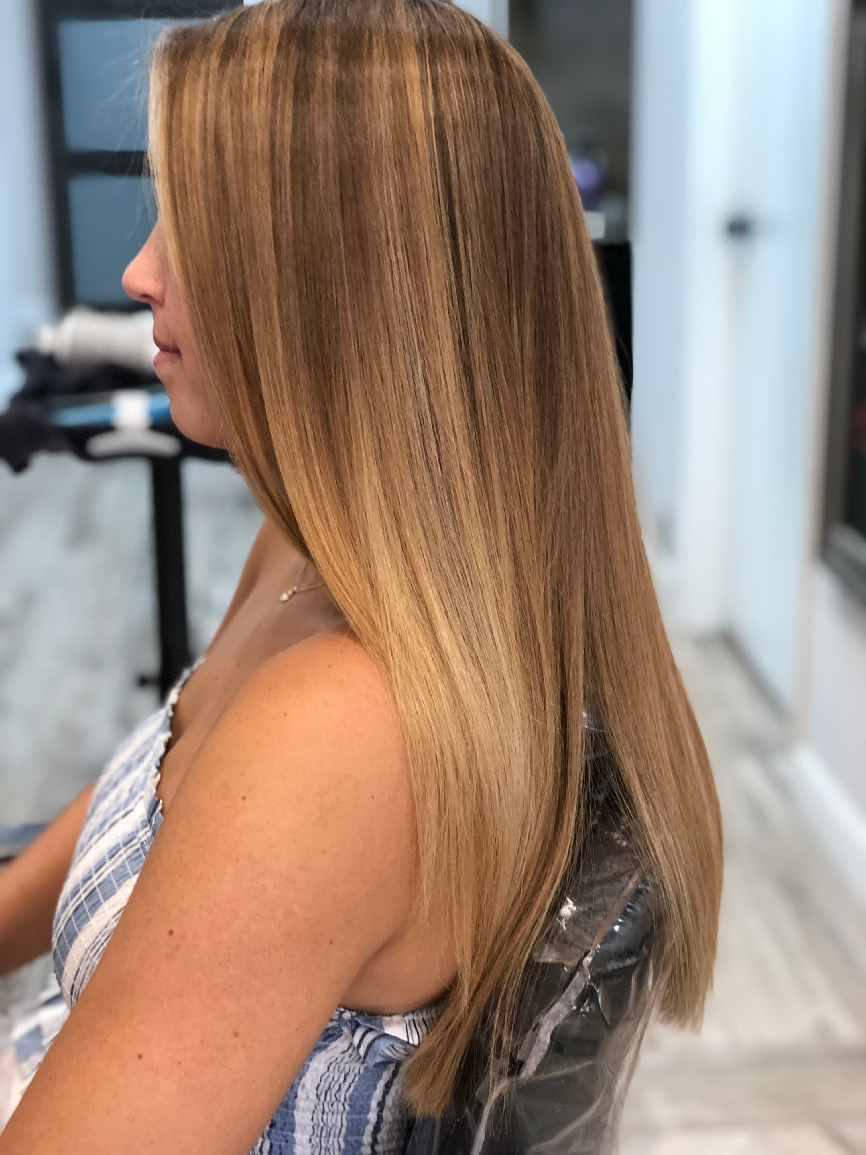 A modern, stylish haircut with clean lines and expertly crafted layers, showcasing a fresh and contemporary look.